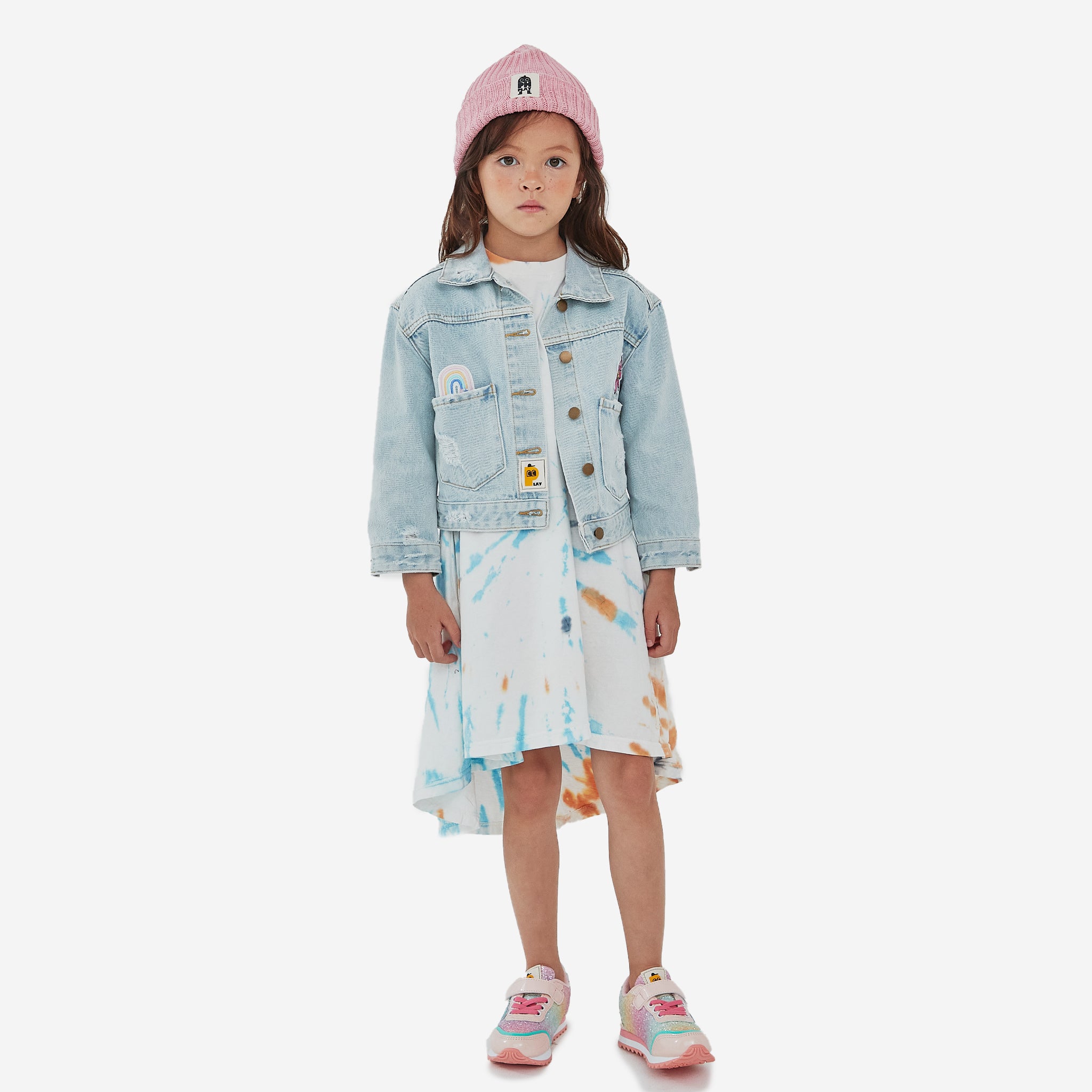 knitted pink hat with black ph play logo on white background