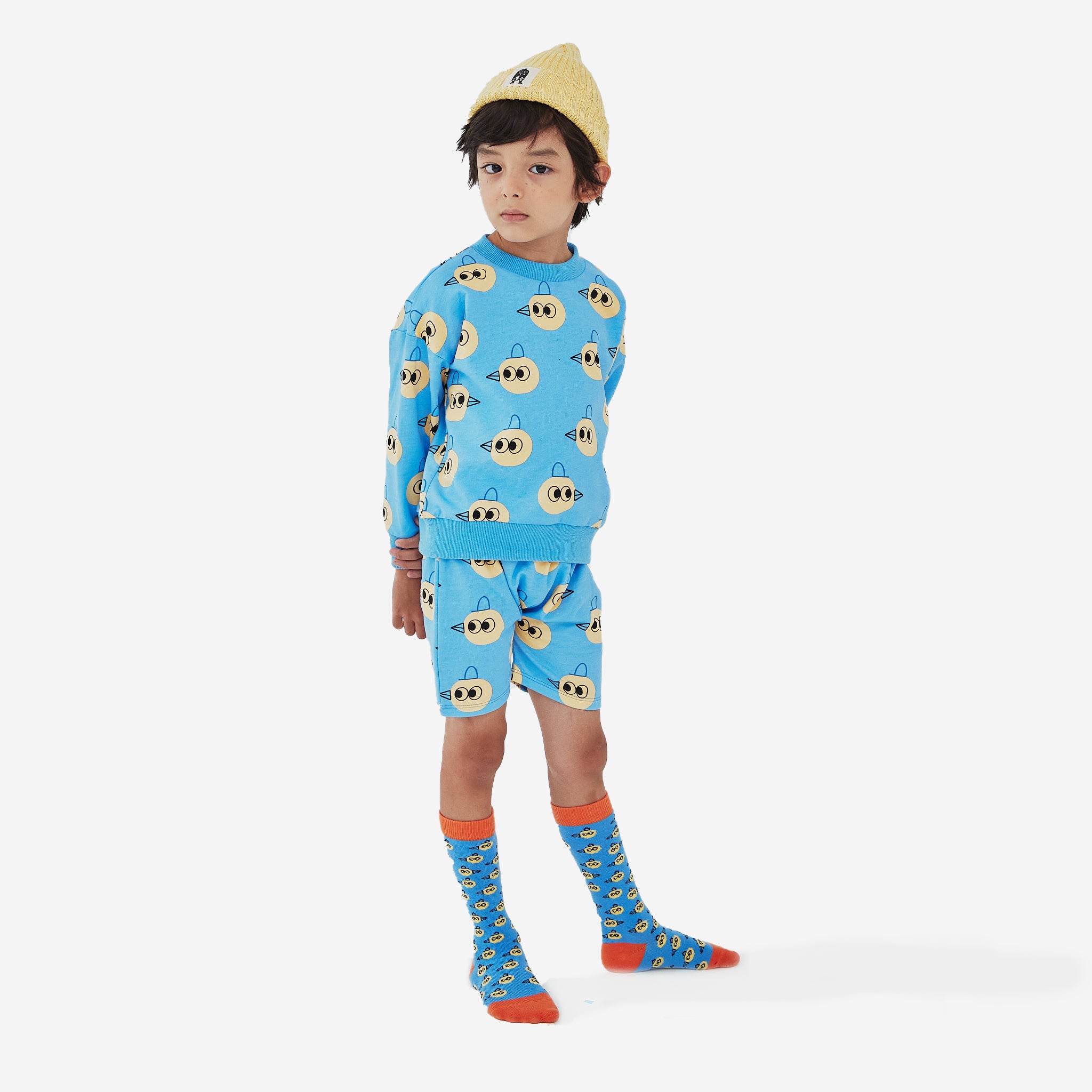 knitted yellow hat with black ph play logo on white background