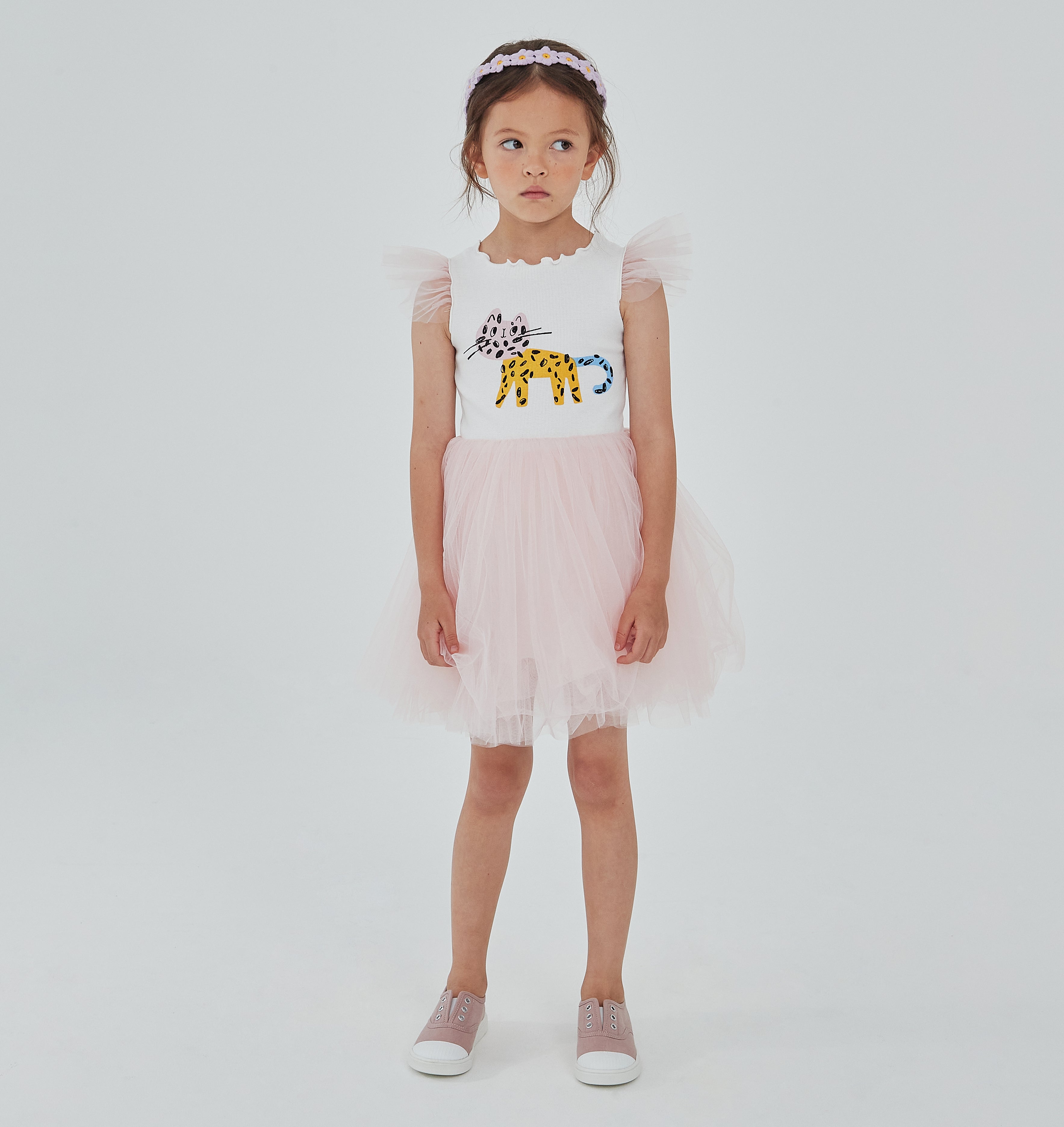 pink and white tutu dress with abstract multicolor cat print on the top front