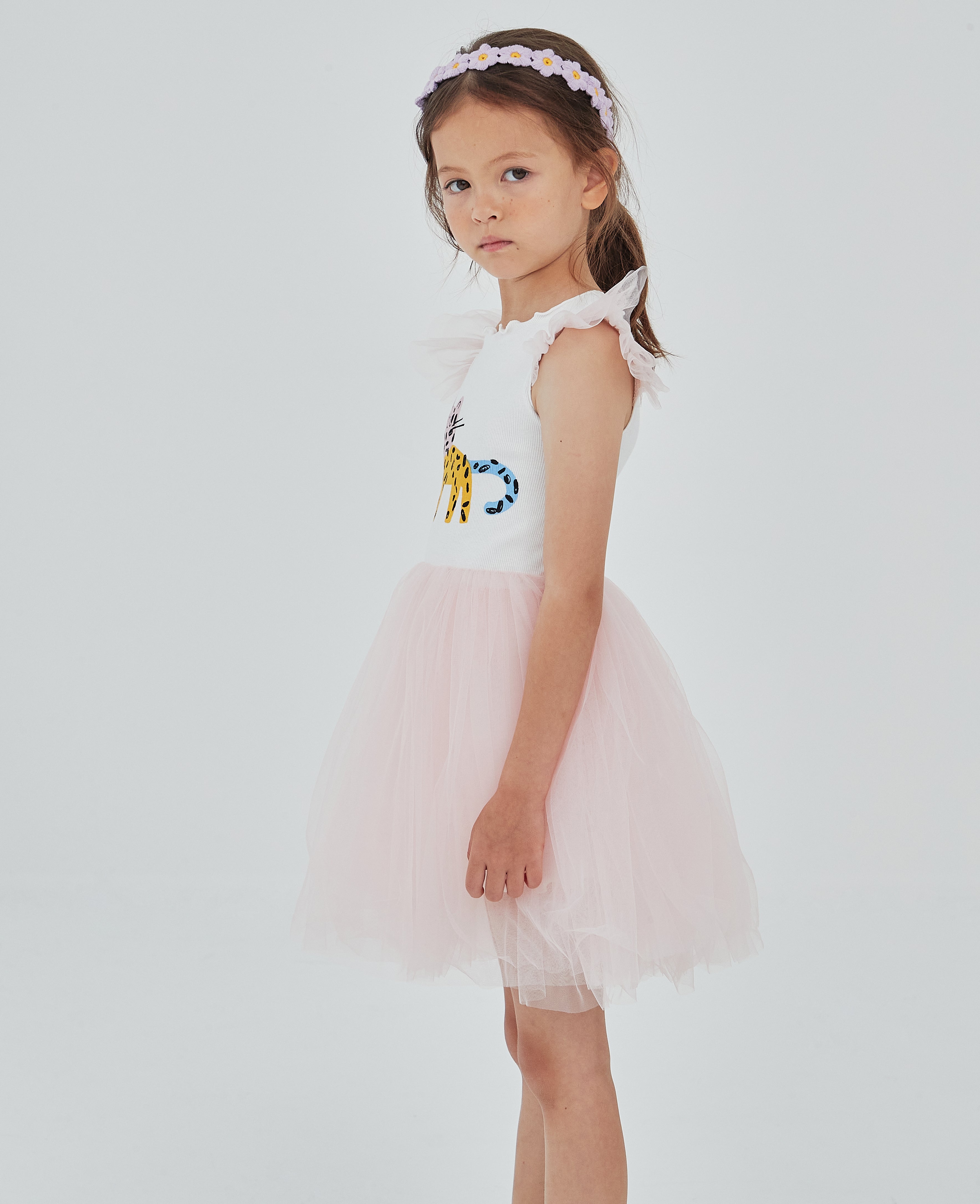 pink and white tutu dress with abstract multicolor cat print on the top front