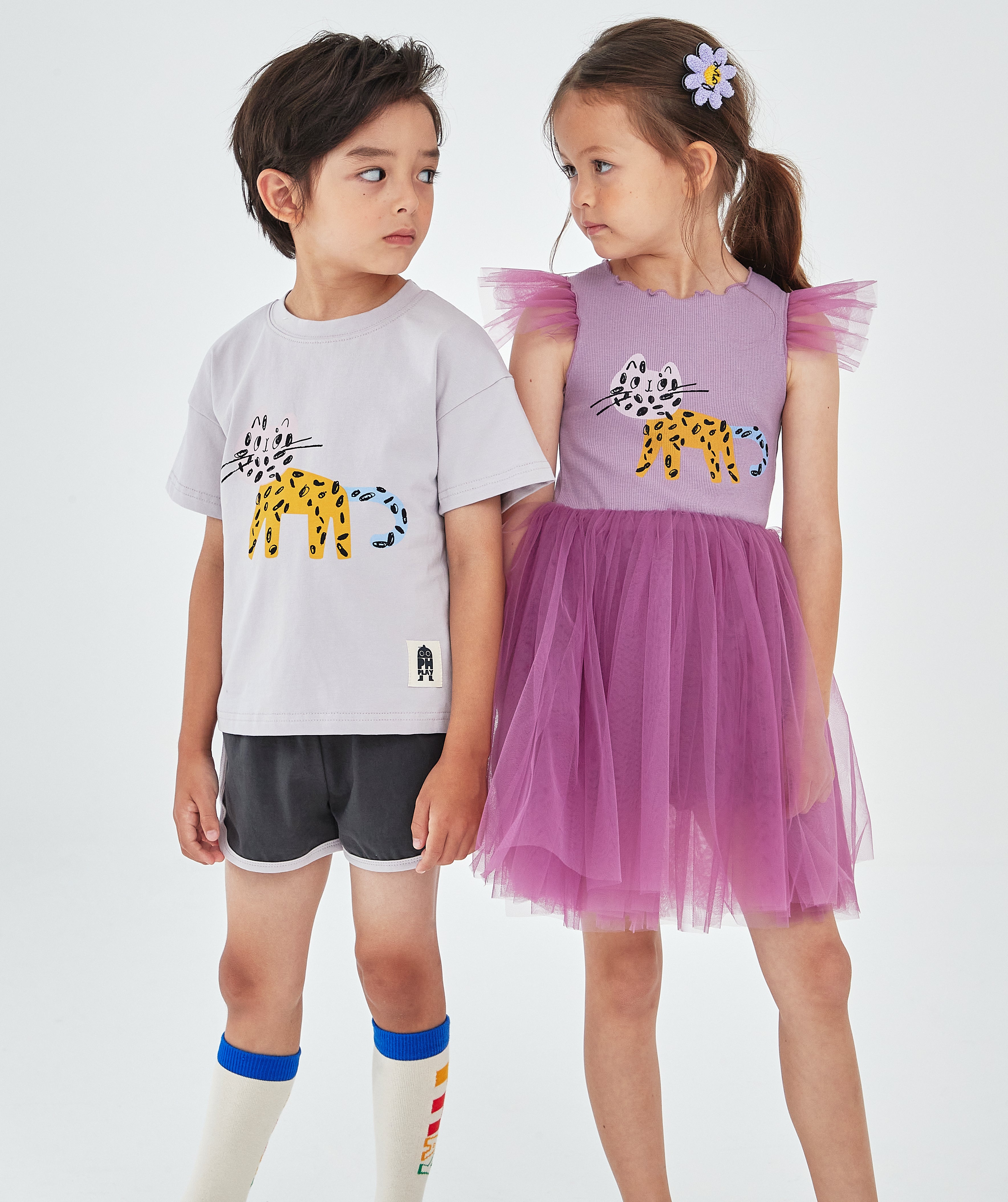 purple tutu dress with abstract multicolor cat print on the top front