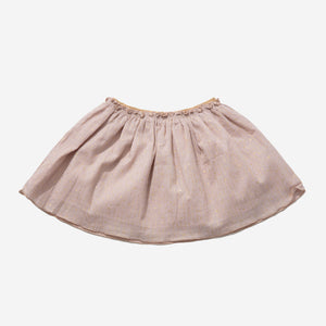 beige skirt with very tiny gold star and lines