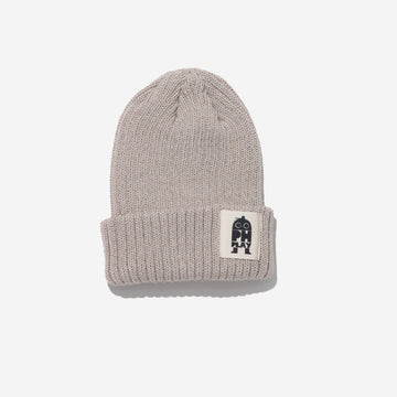 knitted beige hat with black ph play logo on white background
