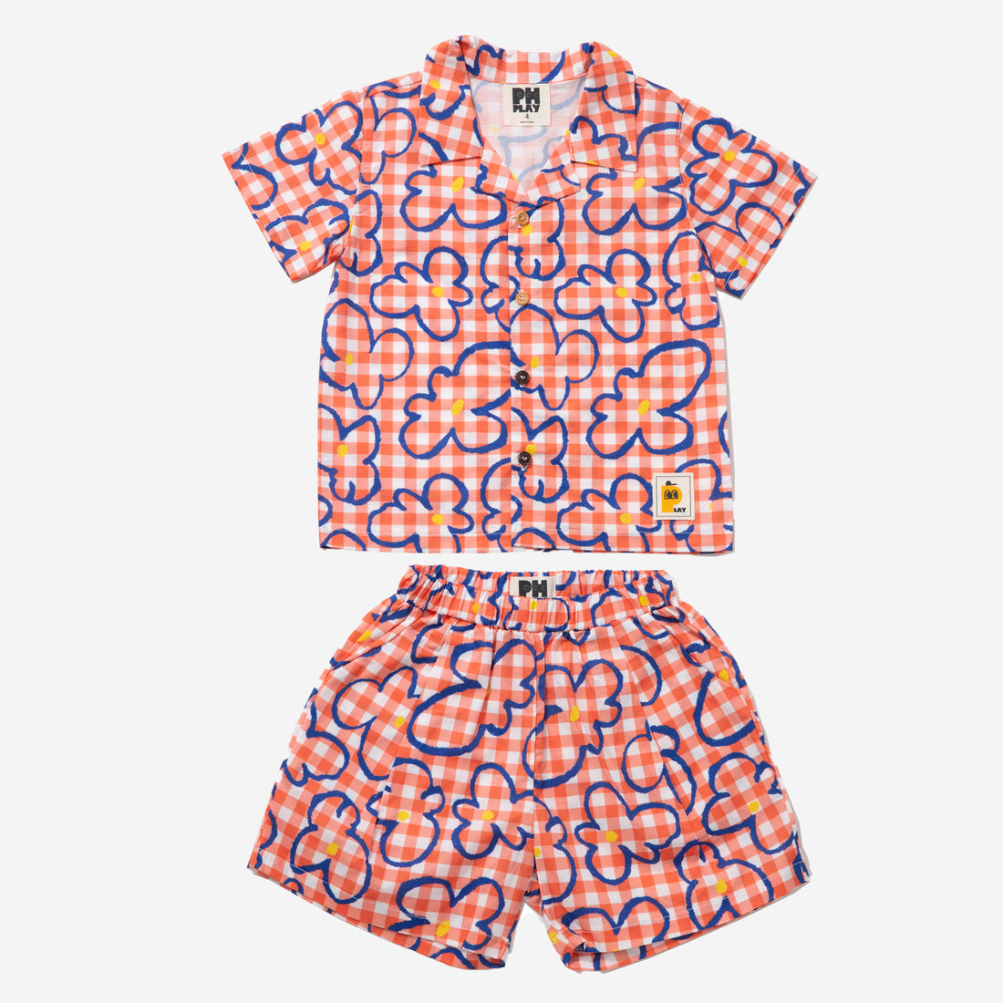 orange checker with blue flowers set includes short sleeves top with buttons on the front and a short 