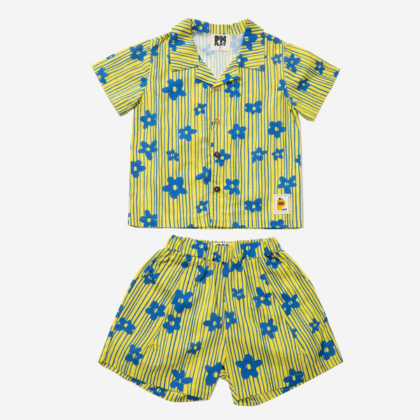 yellow background with blue flowers set includes short sleeves top with buttons on the front and a short 