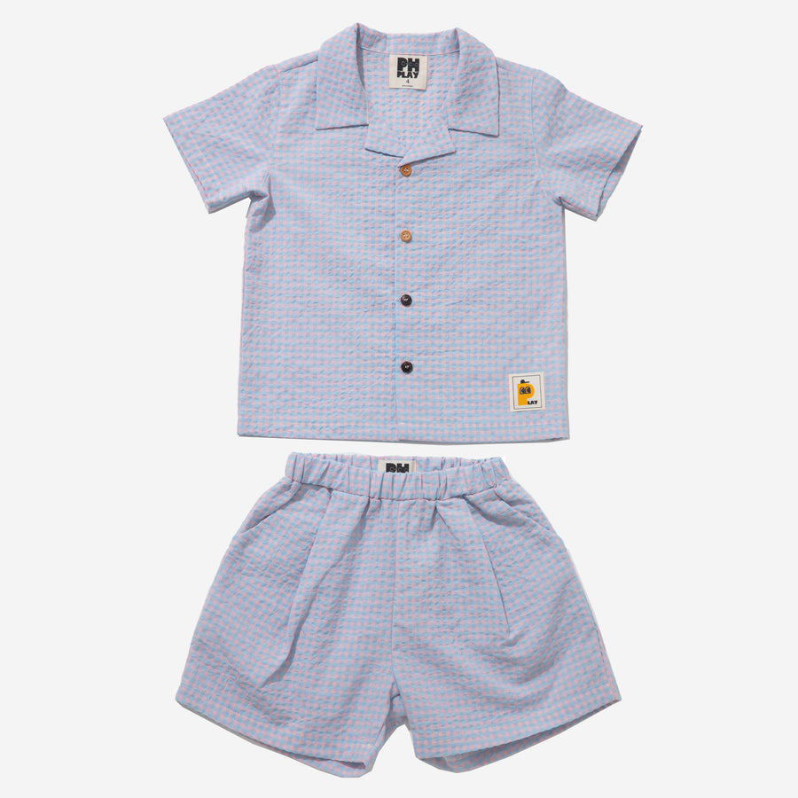 light blue checker set includes short sleeves top with buttons on the front and a short 