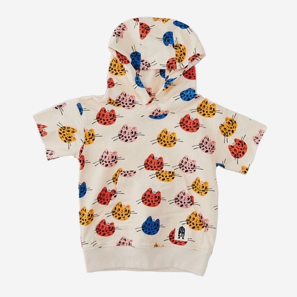 The Multi Cat short sleeves Print Hoodie has a cream background with Multi color abstract cat faces. The hoodie has an attached hat and kangaroo pocket.