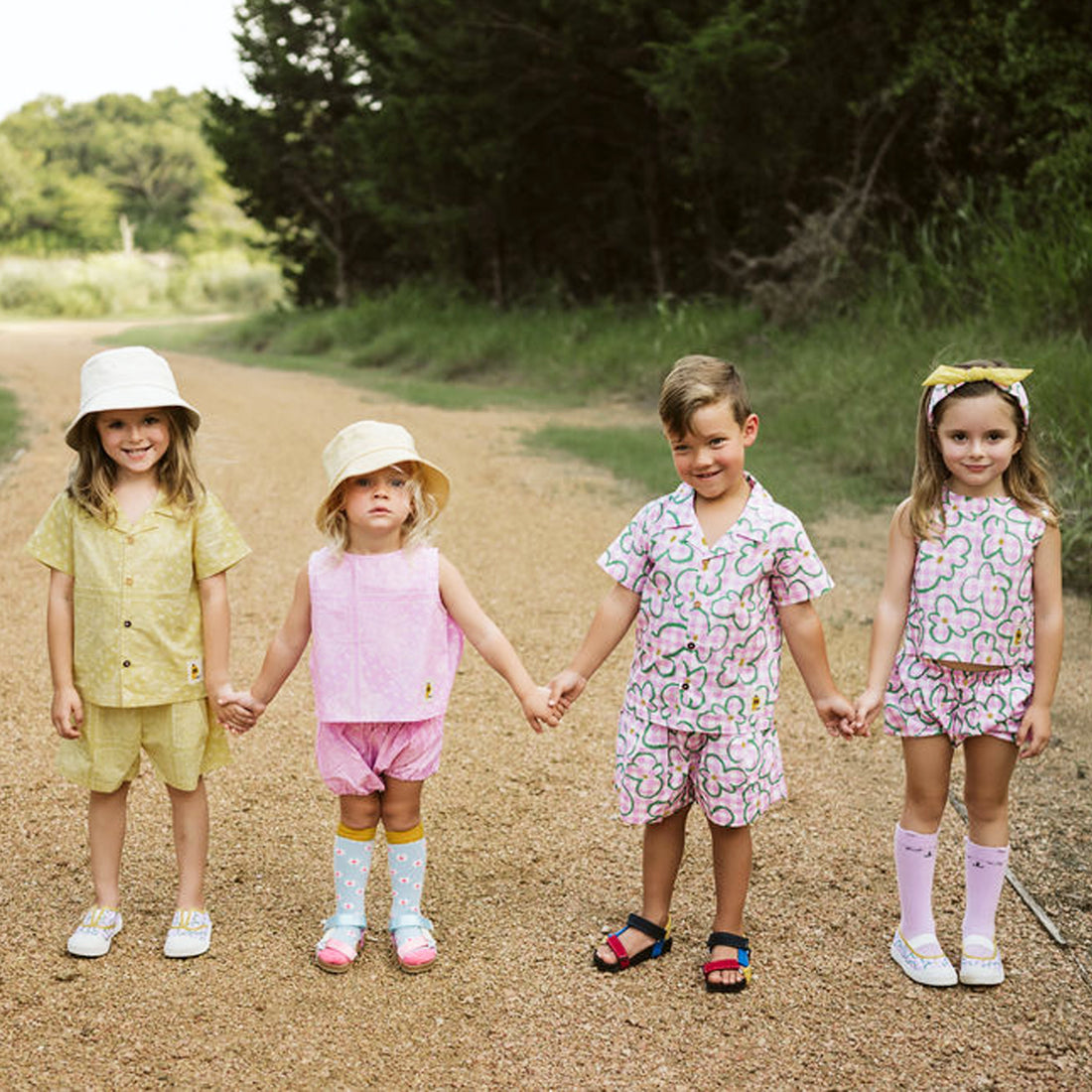 pink checker with green flowers set includes short sleeves top with buttons on the front and a short 