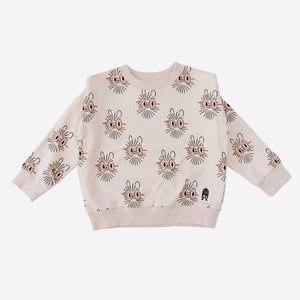 Hedgehog sweatshirt with light peach color background and motives, the sweatshirt has rib round neck and cuffs