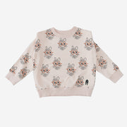 Hedgehog sweatshirt with light peach color background and motives, the sweatshirt has rib round neck and cuffs